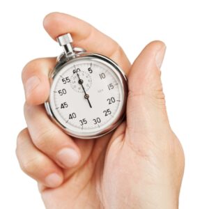 hand holding a stopwatch