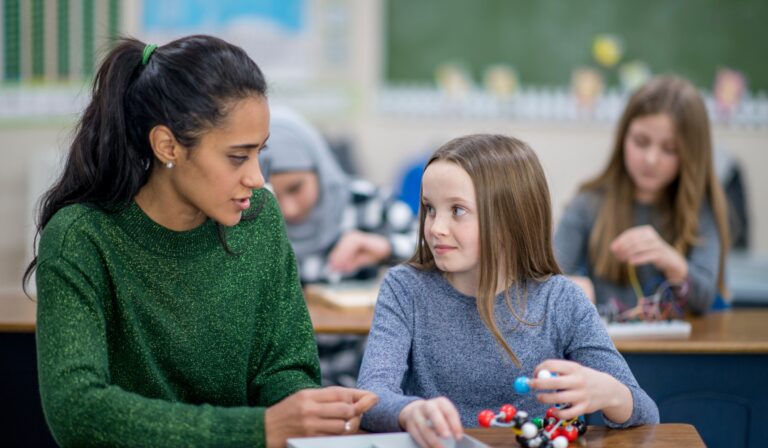 teacher and student talking