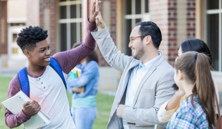teacher student high five
