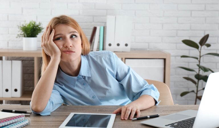 unprofessional woman not taking data, looking bored