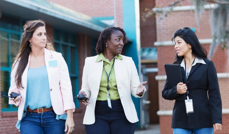 teachers talking meeting