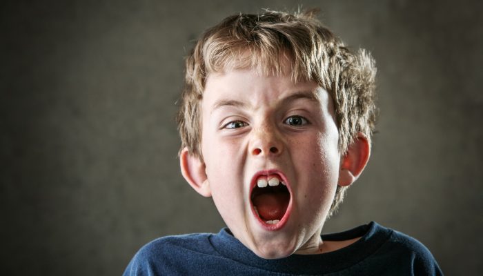 boy yelling, having tantrum