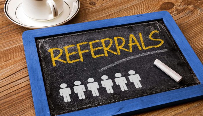 chalkboard with the word referrals written on it - using referrals for behavioral baseline data