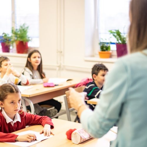 critical teacher pointing at student