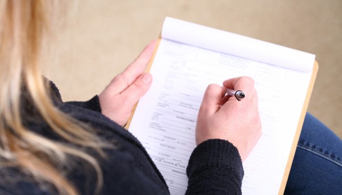 woman filling out a form