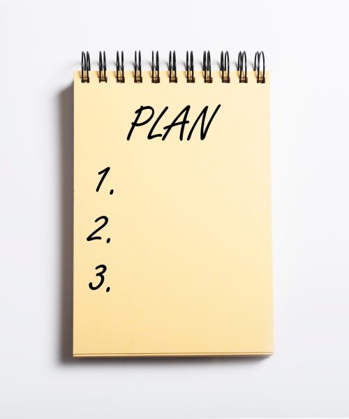 notebook with the word plan and numbers 1-3