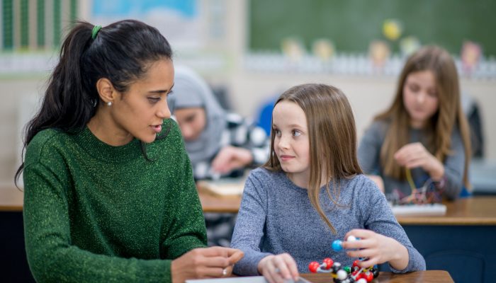 teacher and student talking