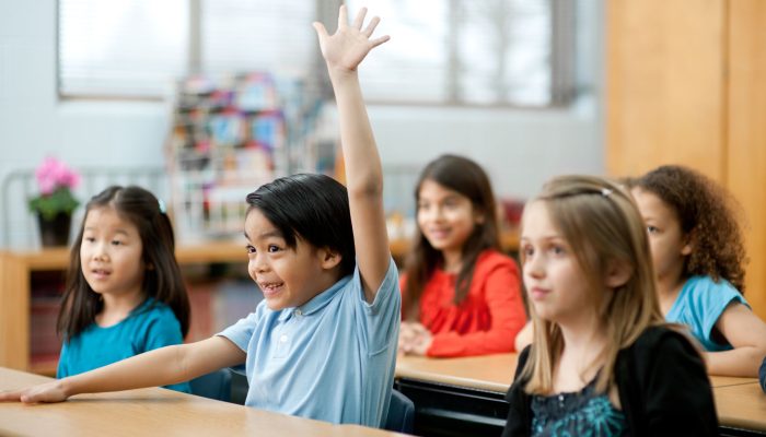 students classroom raise hand