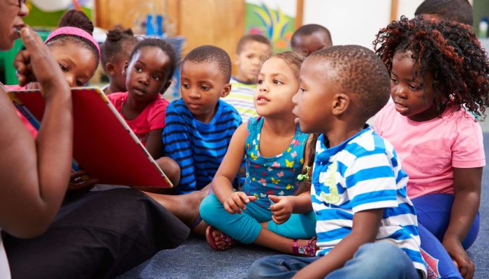 teacher reading to students - make predictions