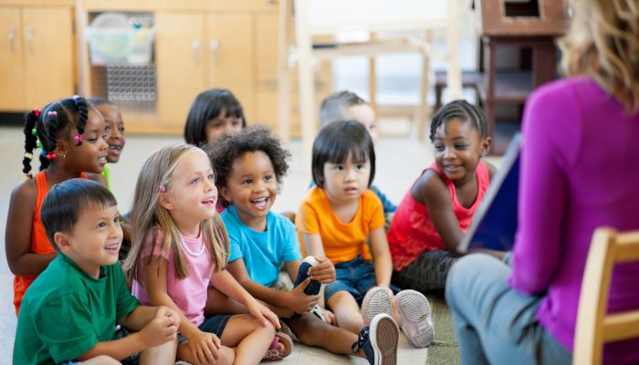 teacher reading to students